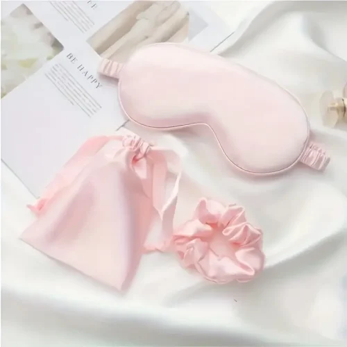 Pink eye mask and scrunchie with a bag